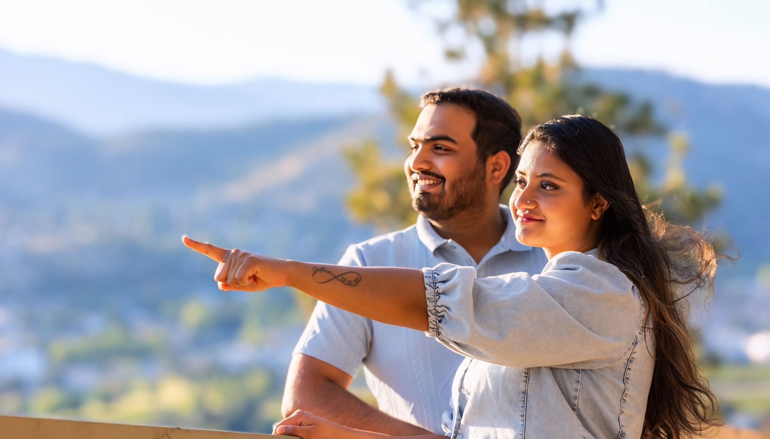 Nivina and Jithin at an Okanagan lookout above Kelowna, BC